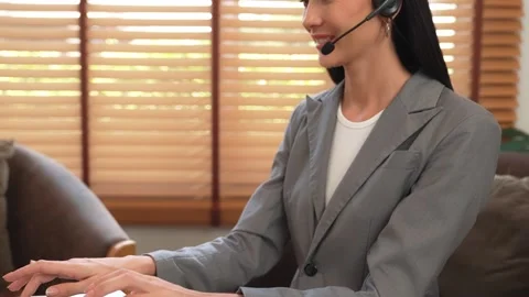 Female call center operator or customer service helpdesk staff. Blithe Stock Footage 266946182