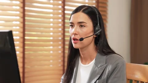Female call center operator or customer service helpdesk staff. Blithe Stock Footage 270989544