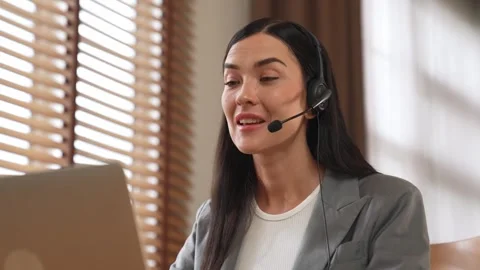 Female call center operator or customer service helpdesk staff. Blithe Stock Footage 271581971