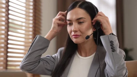 Female call center operator or customer service helpdesk staff. Blithe Video stock 273379579