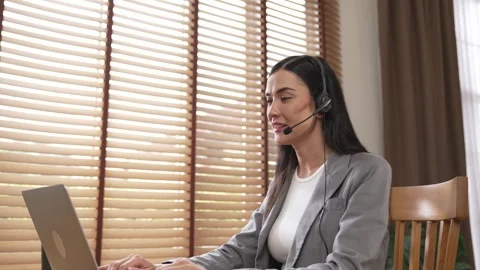 Female call center operator or customer service helpdesk staff. Blithe Video stock 273513265