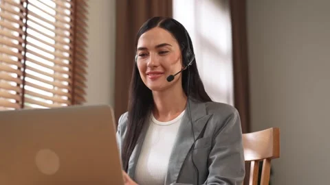 Female call center operator or customer service helpdesk staff. Blithe 스톡 동영상 274413672