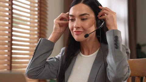 Female call center operator or customer service helpdesk staff. Blithe Stock Footage 274593071