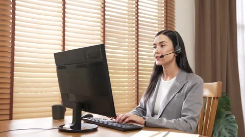 Female call center operator or customer service helpdesk staff. Blithe Video stock 275945153