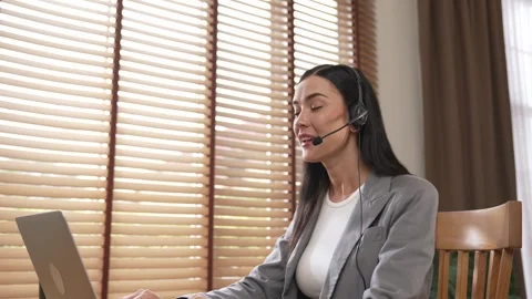 Female call center operator or customer service helpdesk staff. Blithe Stock Footage 276147724