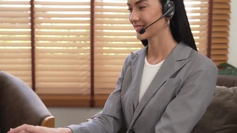 Female call center operator or customer service helpdesk staff. Blithe Stock Footage 276194870