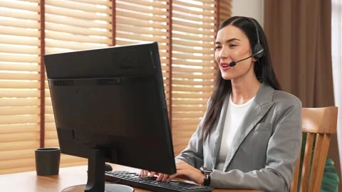 Female call center operator or customer service helpdesk staff. Blithe Stock Footage 277029377