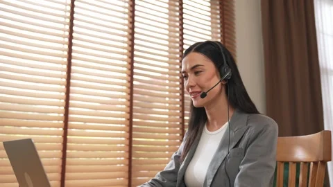 Female call center operator or customer service helpdesk staff. Blithe Stock Footage 277091159