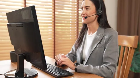 Female call center operator or customer service helpdesk staff. Blithe 스톡 동영상 277092707