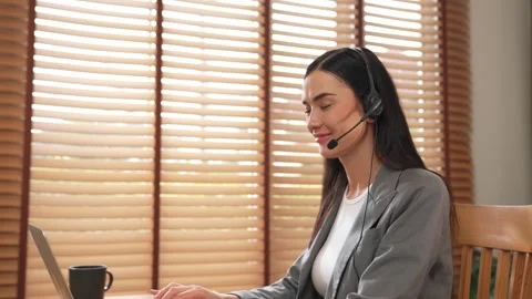 Female call center operator or customer service helpdesk staff. Blithe Stock Footage 277178010