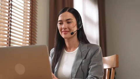 Female call center operator or customer service helpdesk staff. Blithe Stock Footage 277415007