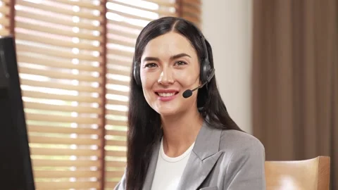 Female call center operator or customer service helpdesk staff. Blithe Stock Footage 278290841
