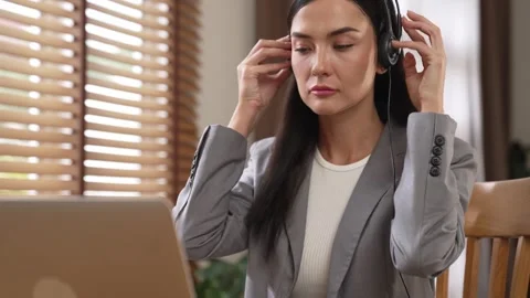 Female call center operator or customer service helpdesk staff. Blithe Video stock 278332733