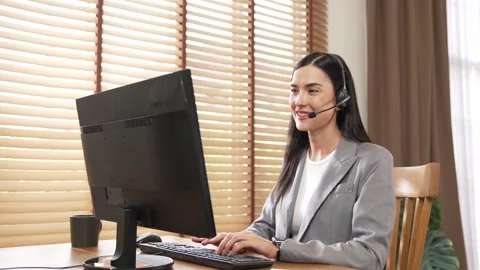 Female call center operator or customer service helpdesk staff. Blithe 스톡 동영상 278547675