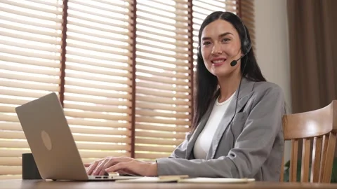 Female call center operator or customer service helpdesk staff. Blithe Stock Footage 278757909