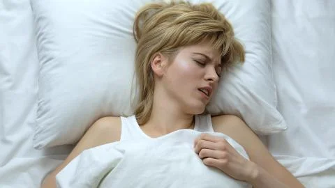 Female cannot move her head and neck, back problem, nerve blockage, inflammation Stock Photos