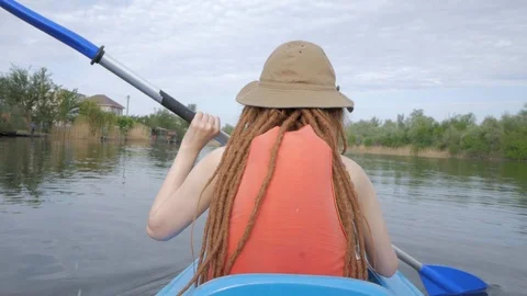 Female on canoe Stock Footage 91974424