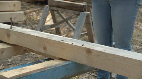 Female Carpenter Checking the Level of a board, 4k 動画素材 109021958