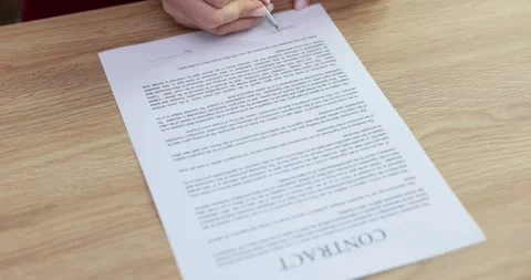 Female changes mind about signing contract refusing to sign Stock Footage 264118795