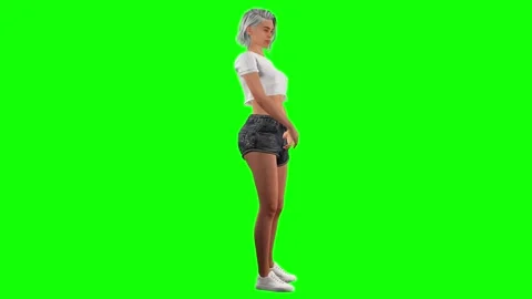 Female character subtle hip shift pose on green screen chromakey Stock Footage 328637031