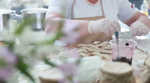 Female chef preparing dumplin Stock Footage 40463365