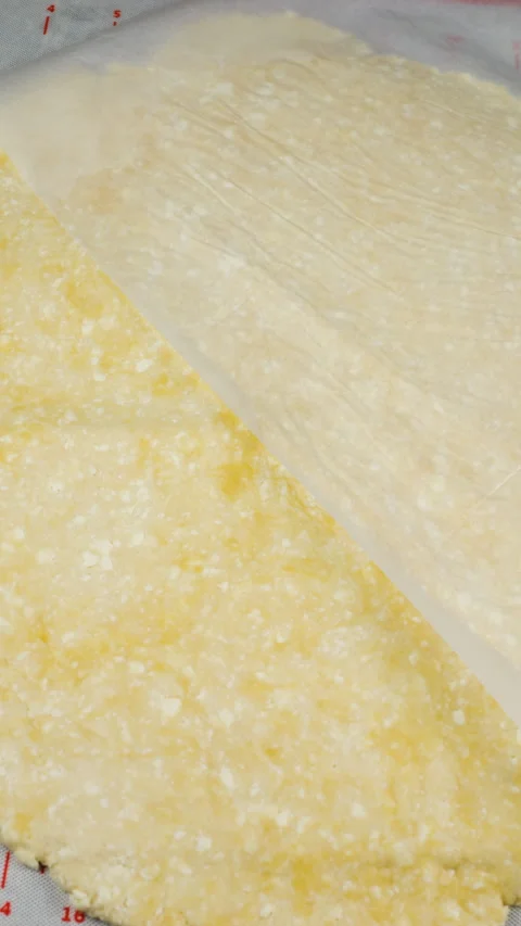 A female chef rolls out cottage cheese dough. Stock-Footage 341512331