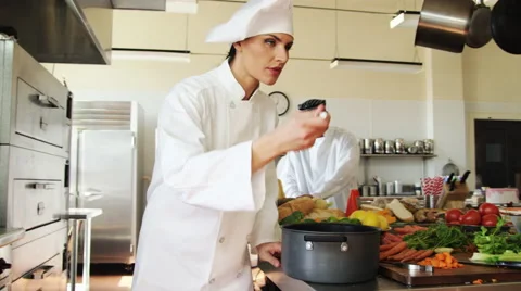Female Chef working in kitchen Stock-Footage 46736975