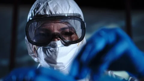 Female chemist doing science experiment with chemicals in the laboratory Stock Footage 95193923