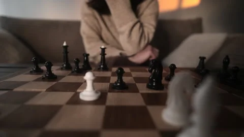 Female Chess Player Deep Thinking About Move During Chess Game In Front Of Stock Footage 341579035
