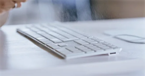 Female Cleaning Office Computer Keyboard With Sanitizer Video stock 127337937