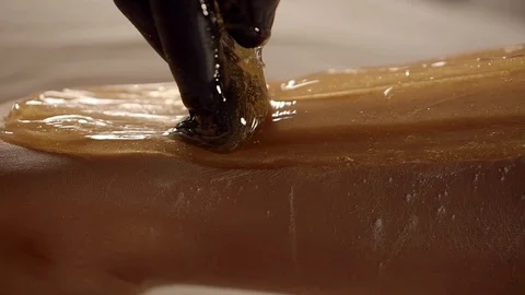 Female client on sugaring at spa 스톡 동영상 90000380