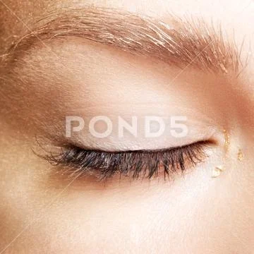 Female closed eyes. Closeup macro beauty portrait of young woman face Stock Photos