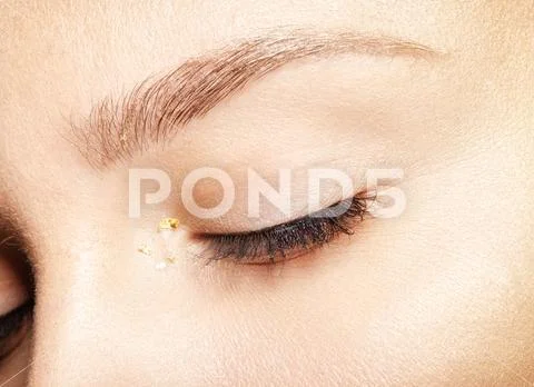 Female closed eyes. Closeup macro beauty portrait of young woman face Stock Photos