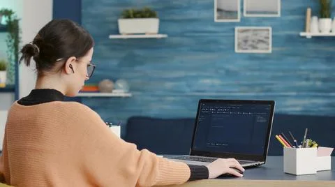 Female coder programming analytics report on technical interface Stockfoto's