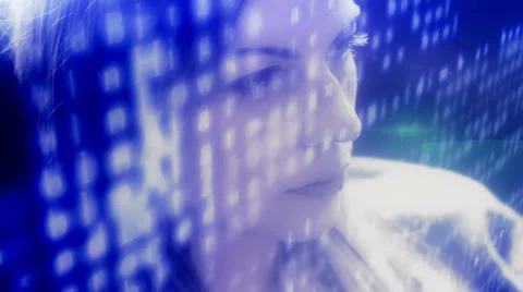 Female coding a program in the future Stock Footage 39024798