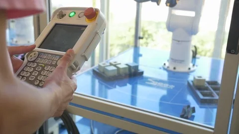 Female College Student Programming Robot Stock Footage 124341153