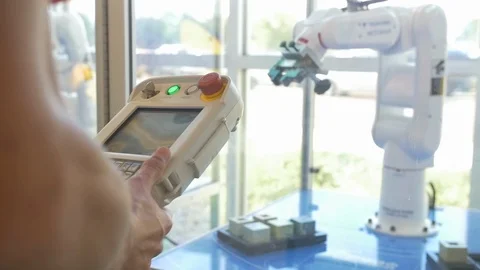 Female College Student Programming Robot Stock Footage 124342176