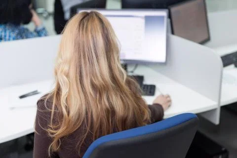 Female computer data entry operator Stock Photos