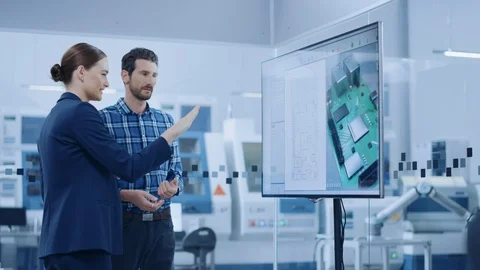 Female Computer Engineer and Male Project Manager Use Digital Interactive Board Stock Footage 124855431