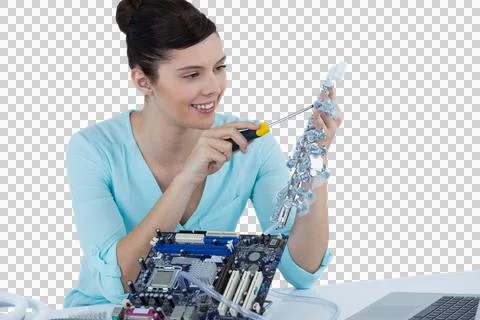 Female computer engineer repairing computer motherboard Stock Photos
