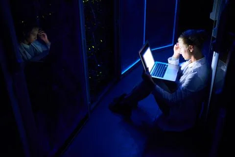 Female Computer Scientist Working at Night 스톡 사진