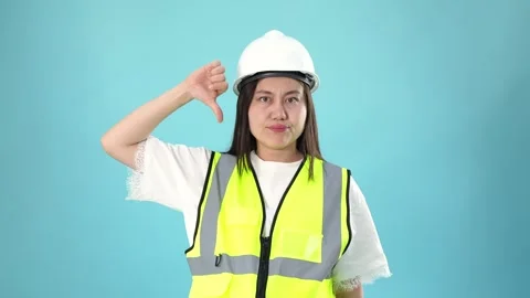 Female Construction Worker Showing Thumbs Down Gesture Stock Footage 344782332
