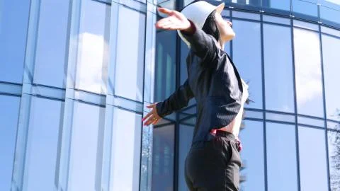 Female contractor in helmet with folder. Building, developing, construction Stock Photos