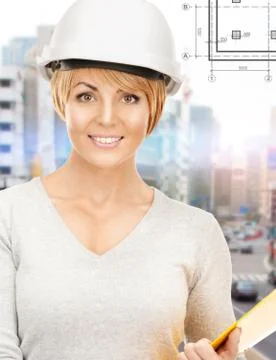 Female contractor in helmet with folder Stock Photos