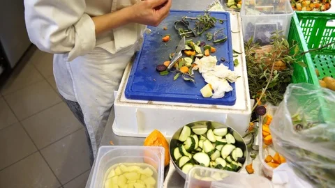 A female cook preparing delicious vegetable skewers, 4K Видео 73310694