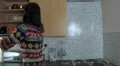 Female cooking food in a hurry HD Footage