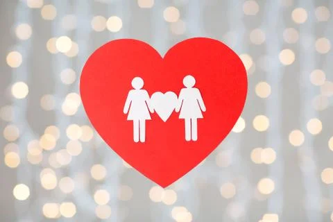Female couple white paper pictogram on red heart Stock Photos