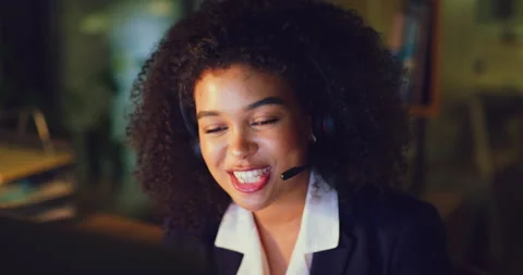 Female customer service representative using headset and consulting clients via Stock Footage 200879650