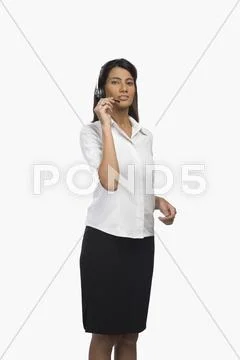 Female customer service representative using a headset Stock Photos