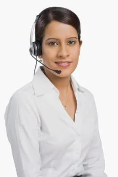 Female customer service representative using a headset Stock Photos